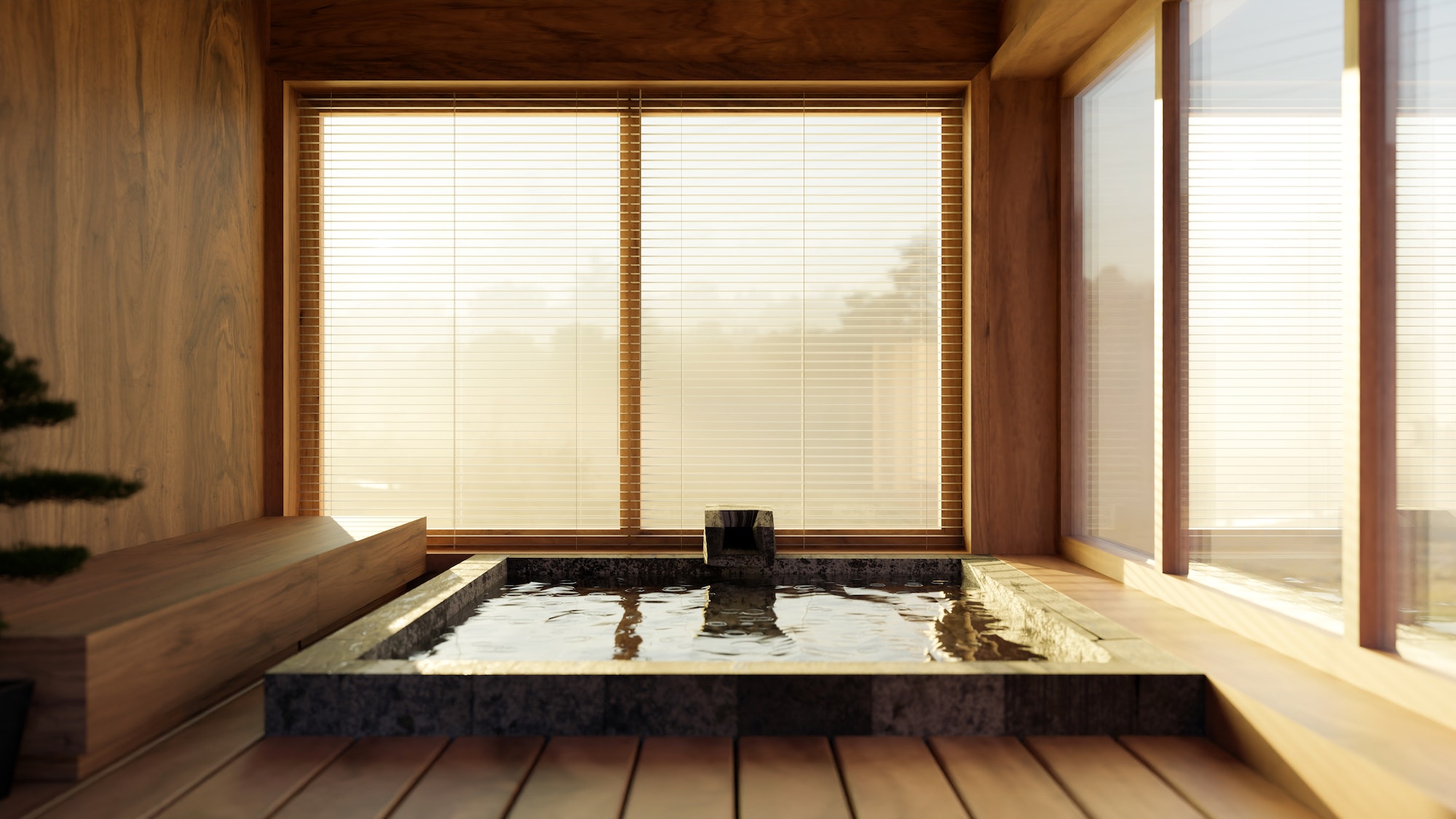 Beautiful luxury indoor Japanese Onsen interior design with bath against the door slides